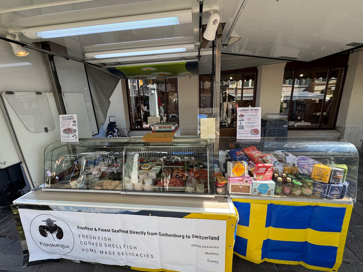 The Fiskskaldjur stand at Morges Market with fresh seafood and Swedish groceries
